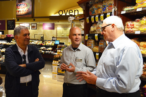 A Specialty Cellars sales rep with a buyer